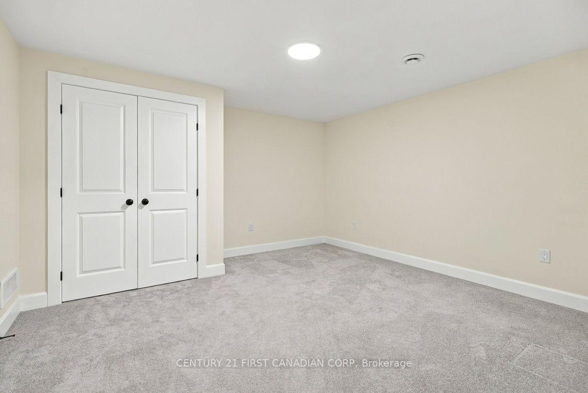 Photo 34 of 12 Briscoe Crescent, Strathroy-Caradoc, NE — HOMEH