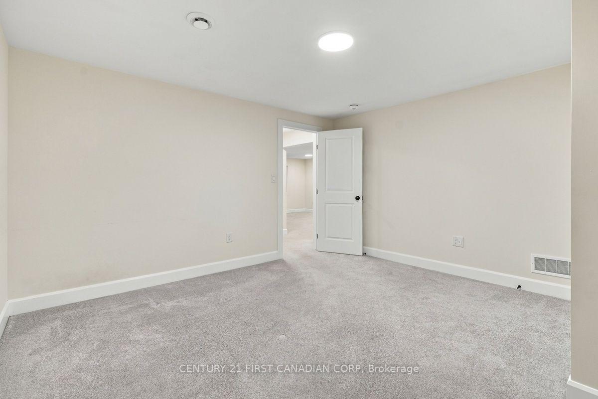 Photo 35 of 12 Briscoe Crescent, Strathroy-Caradoc, NE — HOMEH
