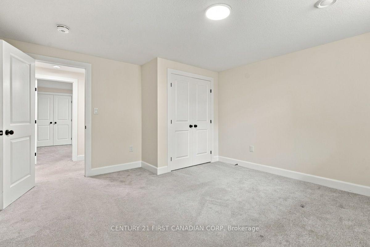 Photo 37 of 12 Briscoe Crescent, Strathroy-Caradoc, NE — HOMEH