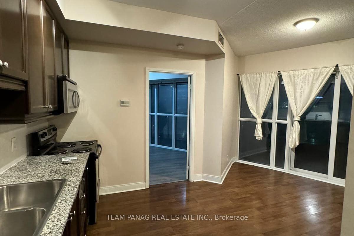 Photo 3 of Unit 504, 60 Absolute Avenue, Mississauga, City Centre — HOMEH