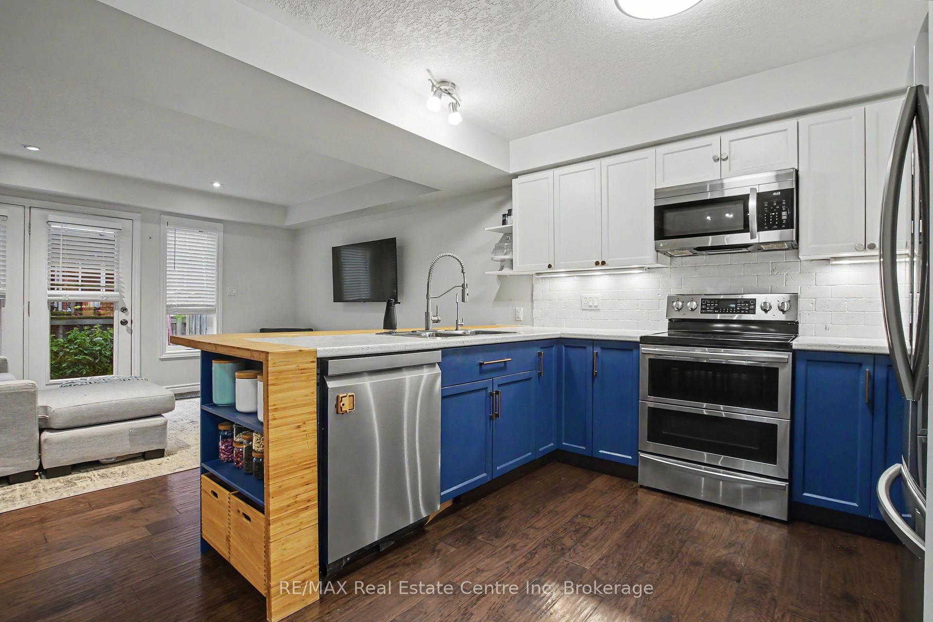 Photo 8 of Unit 15, 167 Arkell Road, Guelph, Kortright East — HOMEH