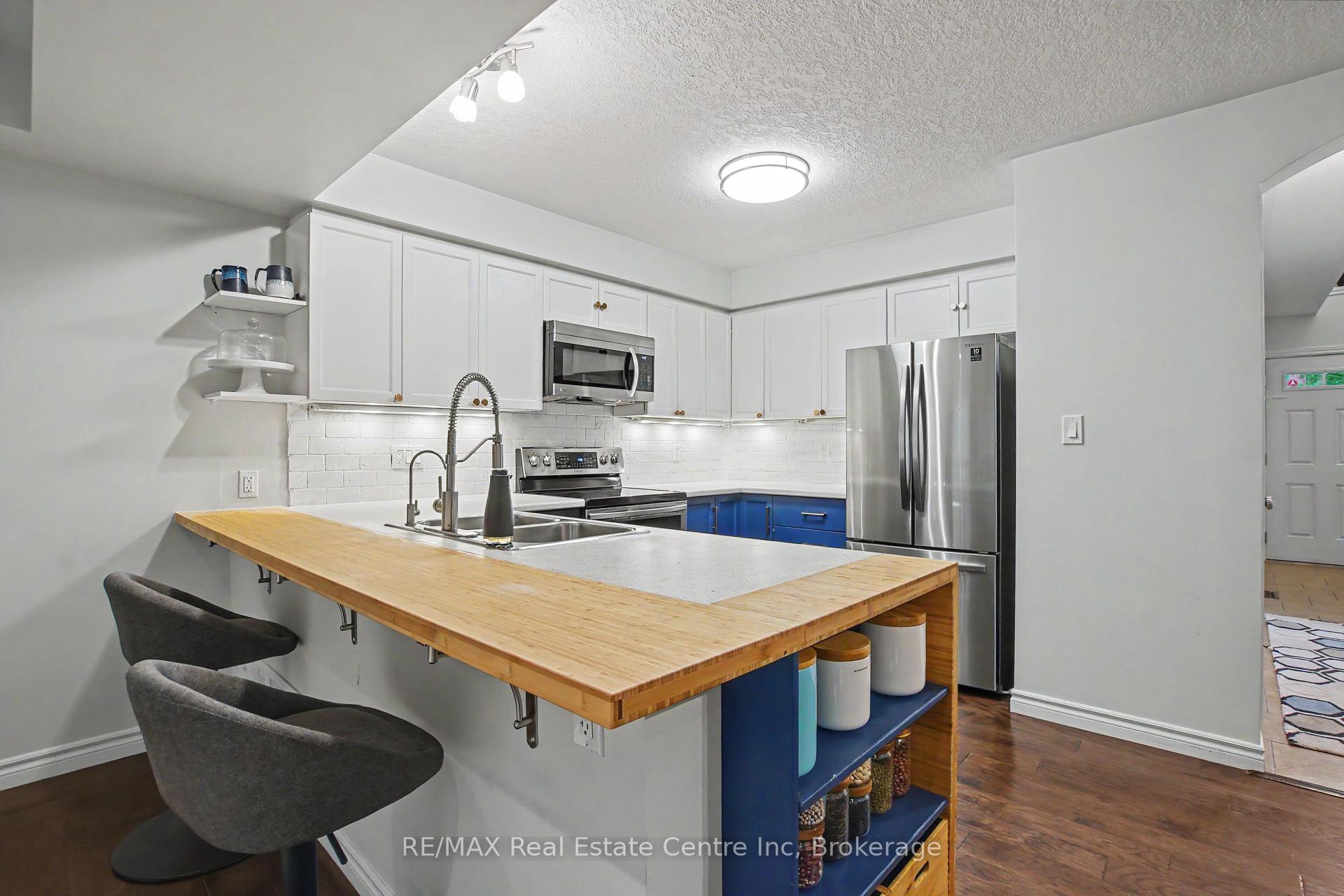 Photo 9 of Unit 15, 167 Arkell Road, Guelph, Kortright East — HOMEH