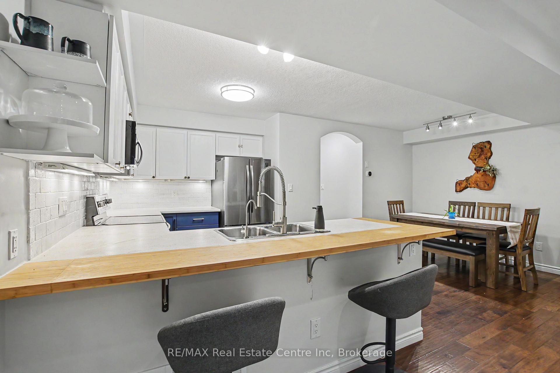 Photo 10 of Unit 15, 167 Arkell Road, Guelph, Kortright East — HOMEH
