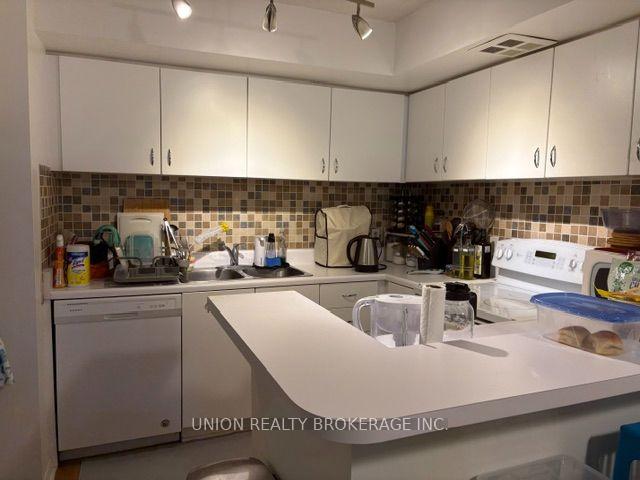 Photo 3 of Unit 411, 25 The Esplanade, Toronto, Waterfront Communities — HOMEH