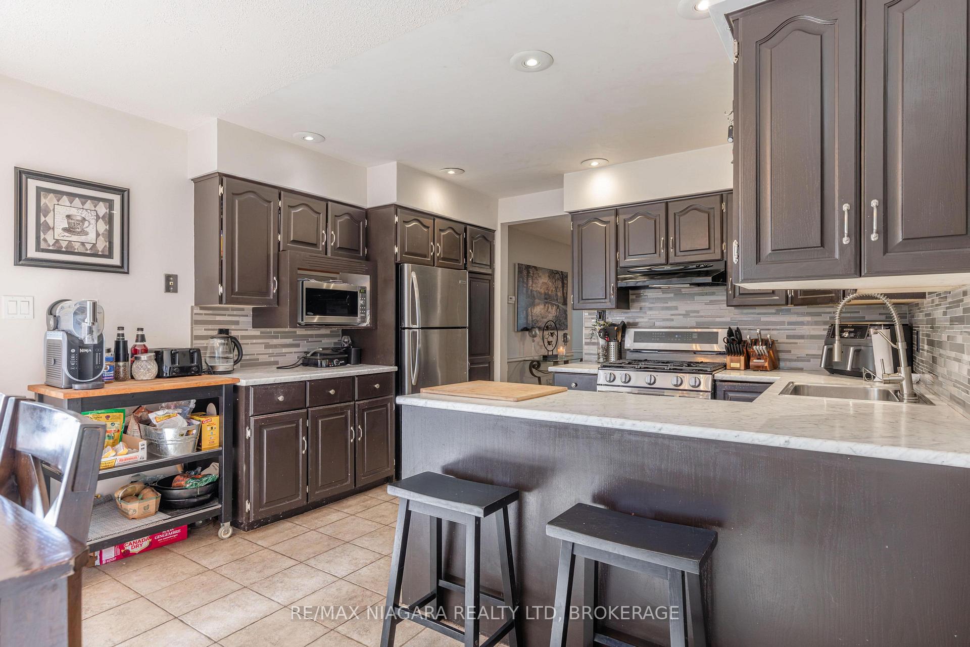 Photo 11 of 7873 Beaverdams Road, Niagara Falls, Ascot — HOMEH