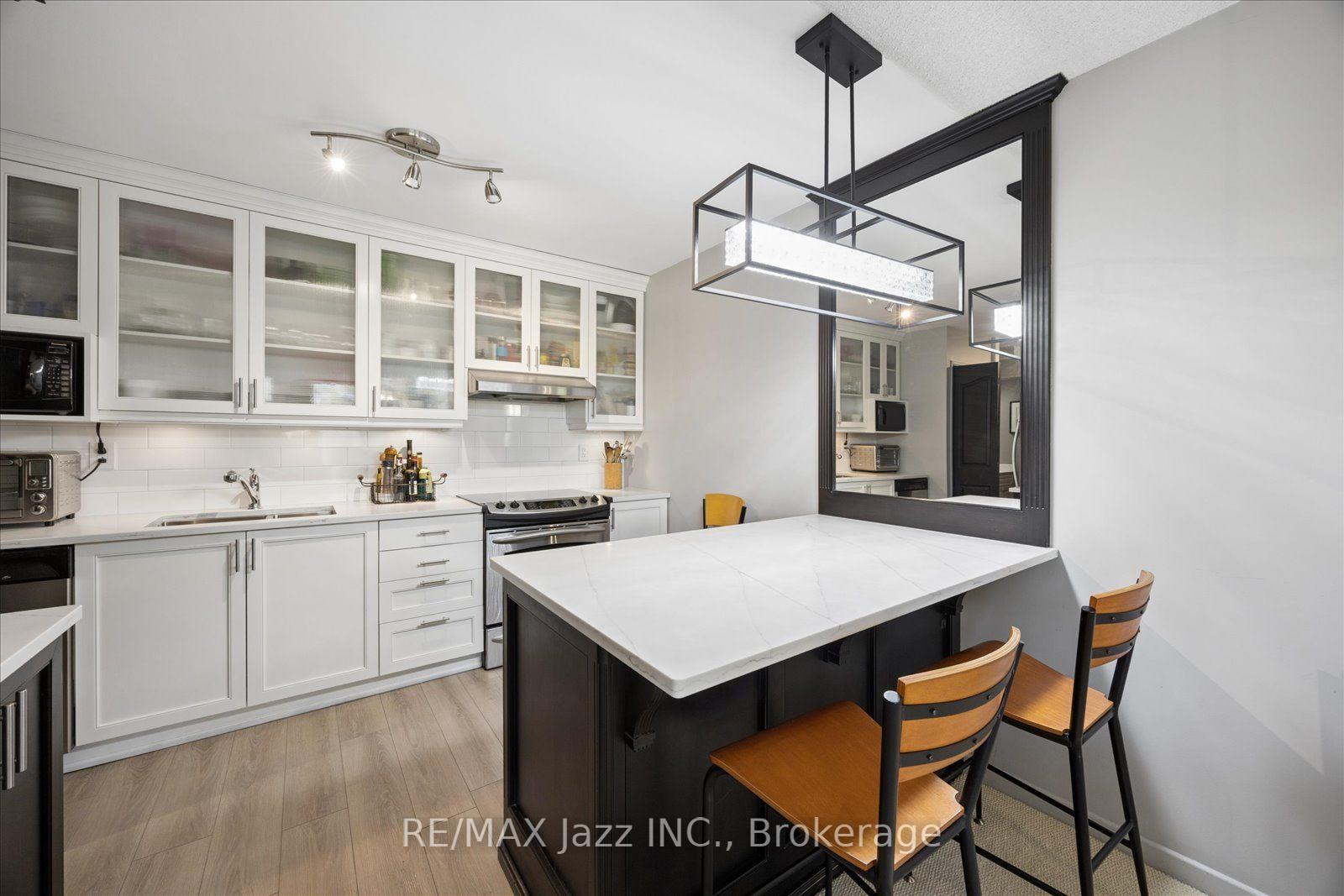 Photo 19 of Unit 405, 337 Simcoe Street N, Oshawa, O'Neill — HOMEH
