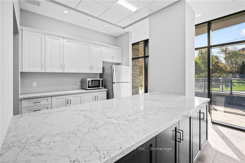 Photo 44 of Unit 304, 30 Hamilton Street S, Hamilton, Waterdown — HOMEH