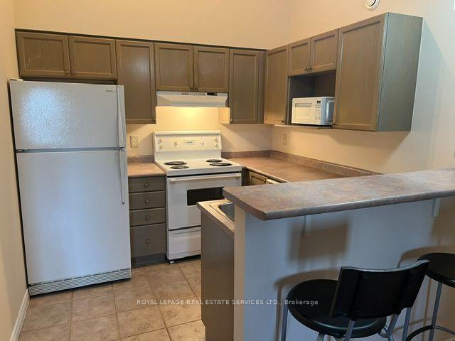 Photo 4 of Unit 408, 4005 Kilmer Drive, Burlington, Tansley — HOMEH