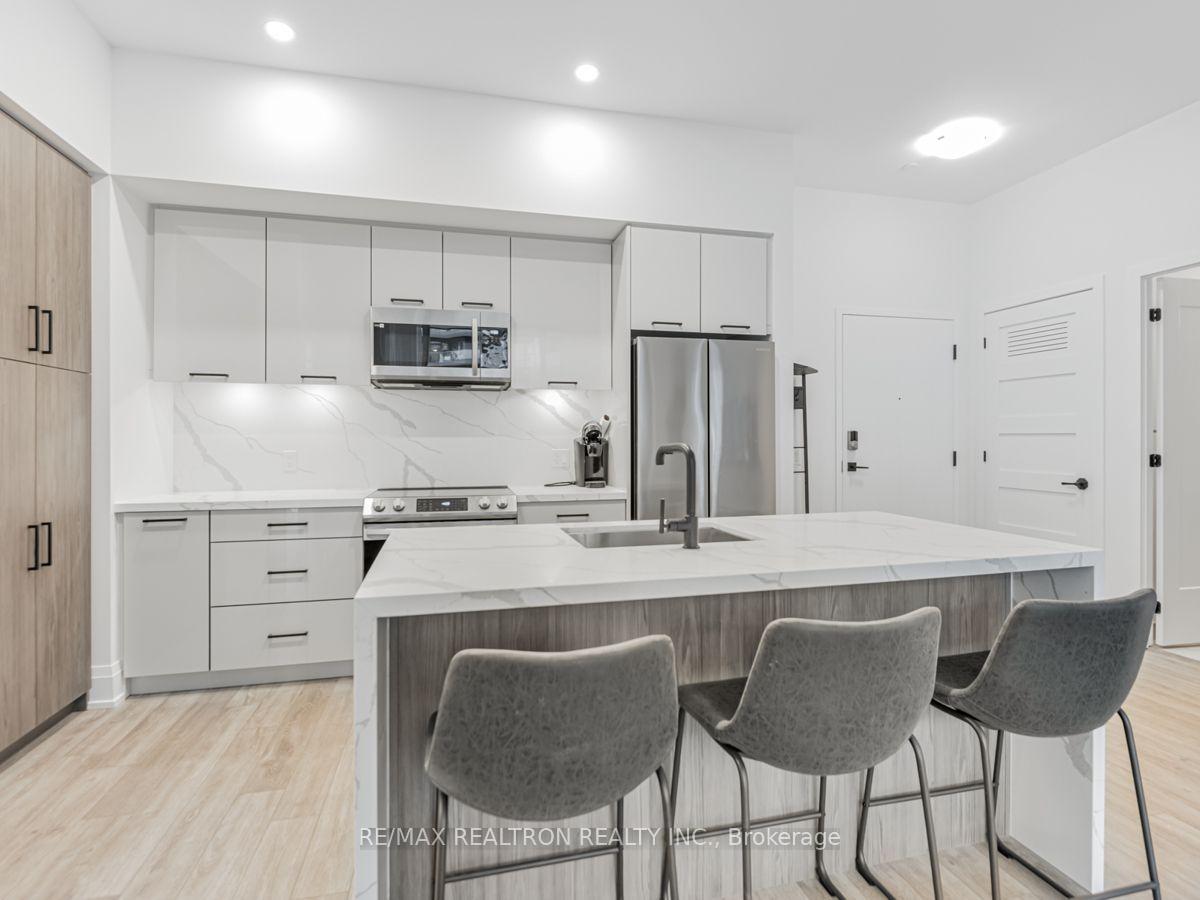 Photo 11 of Unit 128, 415 SeaRay Avenue, Innisfil, Rural Innisfil — HOMEH