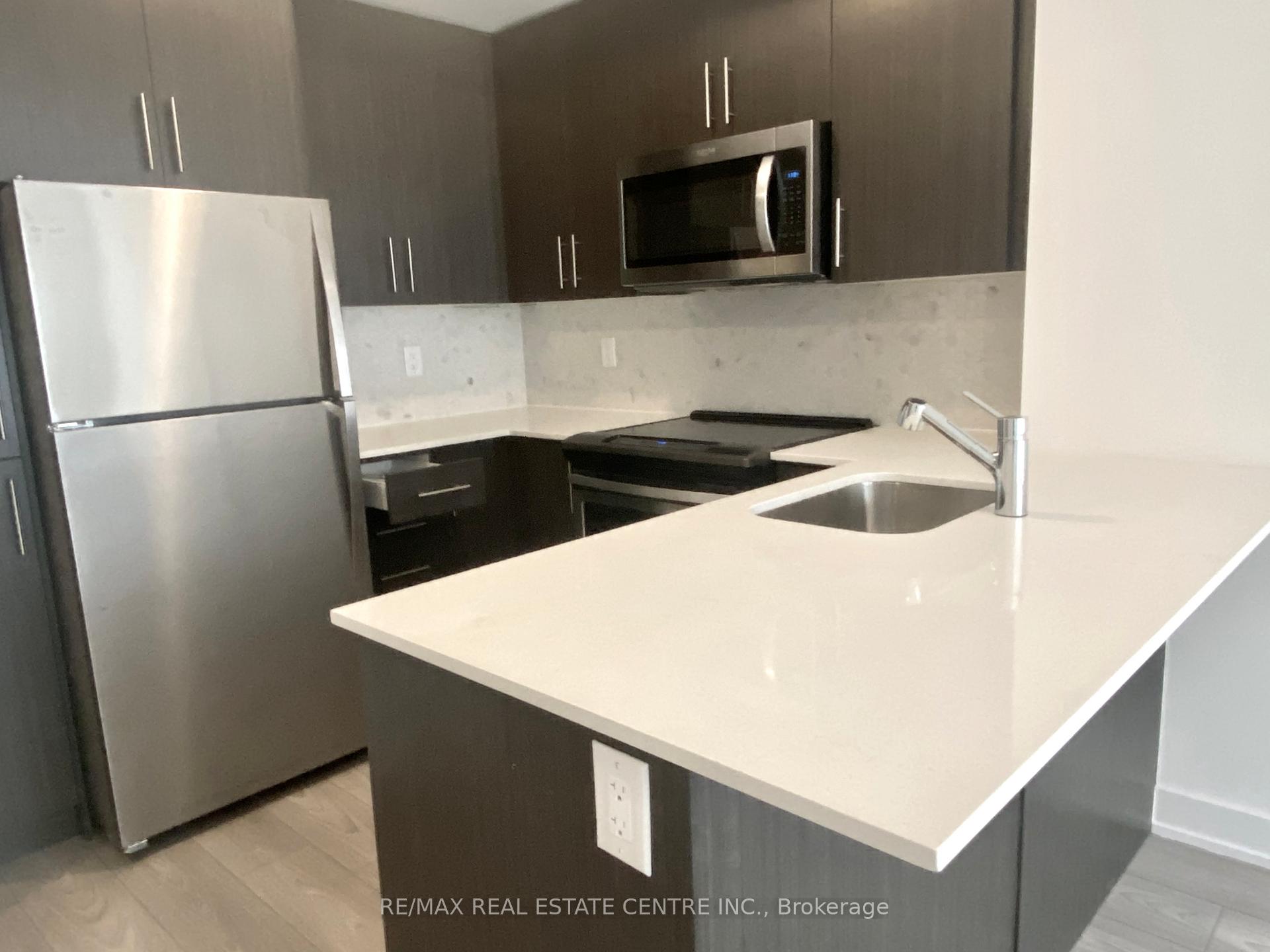 Photo 3 of Unit 5, 3483 Widdicombe Way, Mississauga, Erin Mills — HOMEH