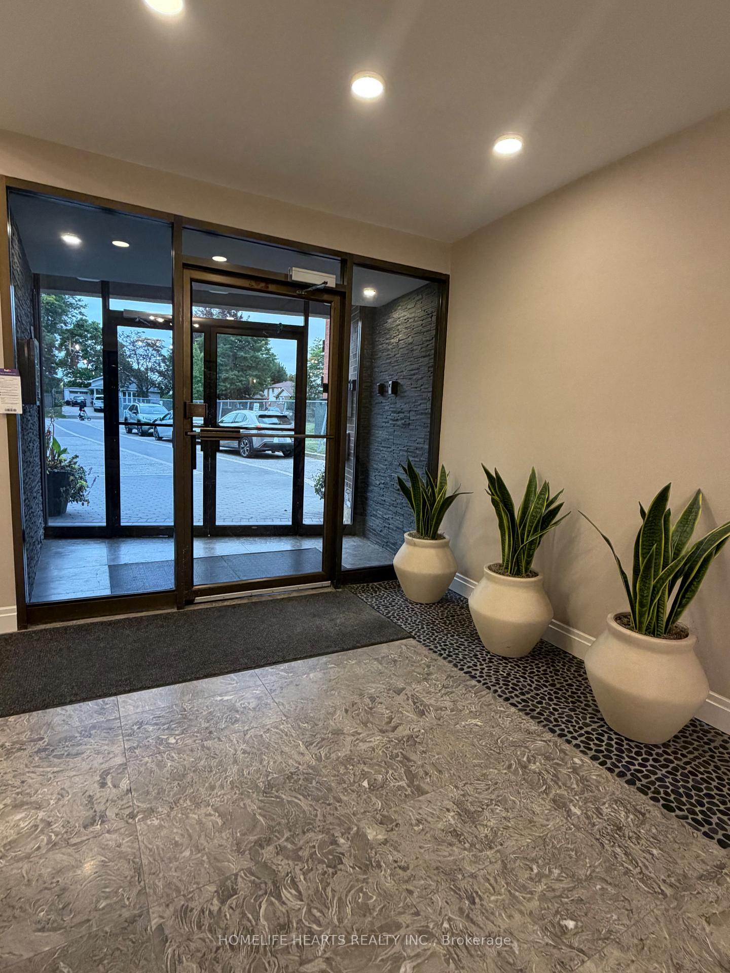 Photo 4 of Unit 407, 188 Mill Street S, Brampton, Brampton South — HOMEH