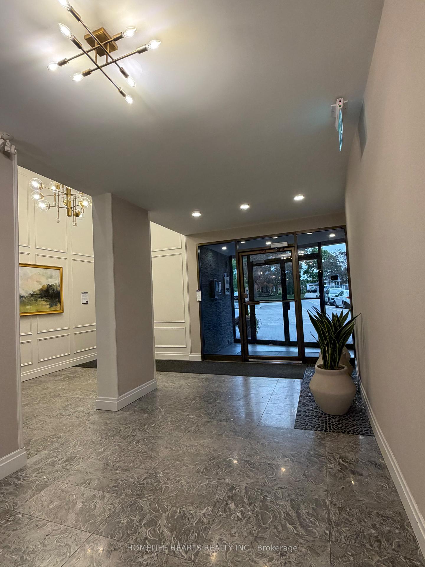 Photo 5 of Unit 407, 188 Mill Street S, Brampton, Brampton South — HOMEH