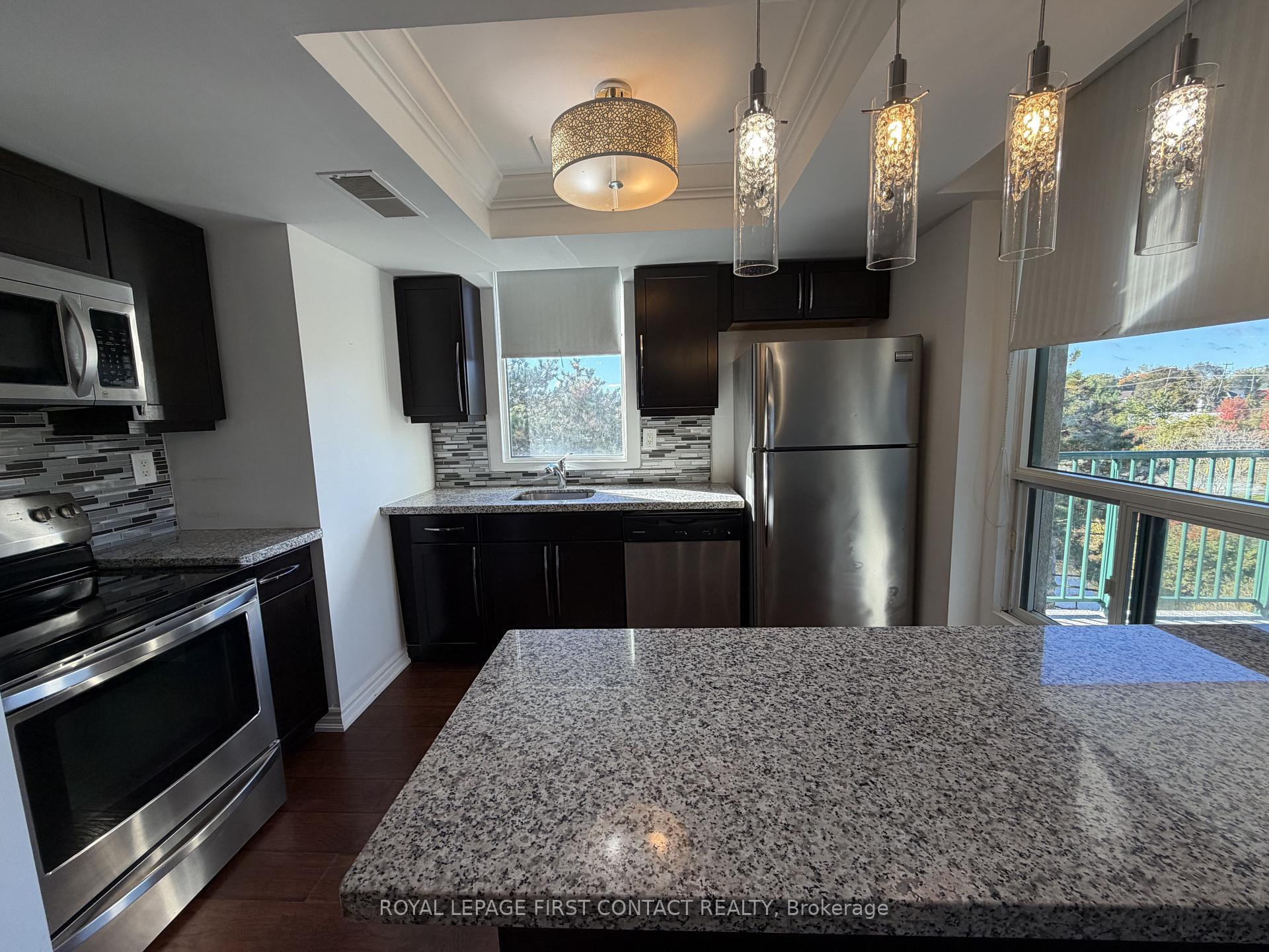 Photo 3 of Unit 403, 75 Ellen Street, Barrie, City Centre — HOMEH