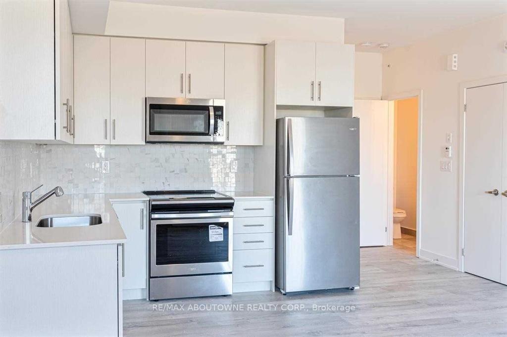 Photo 7 of Unit 18, 3483 Widdicombe Way, Mississauga, Erin Mills — HOMEH