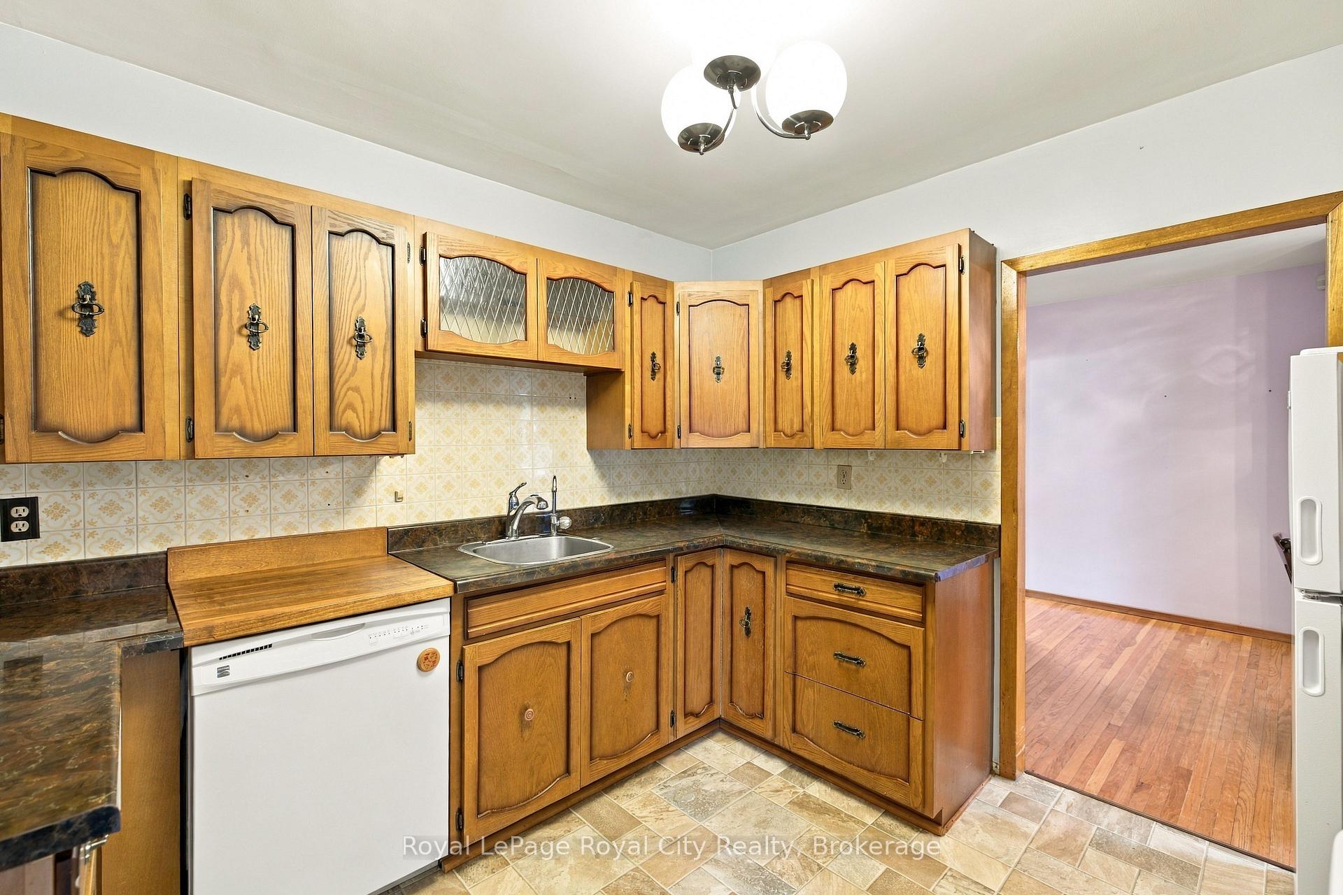 Photo 9 of 166 Victoria Road N, Guelph, St. George's — HOMEH