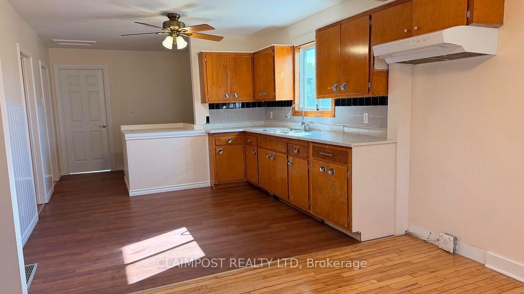 Photo 4 of 418 Birch Street S, Timmins, TS - SE — HOMEH