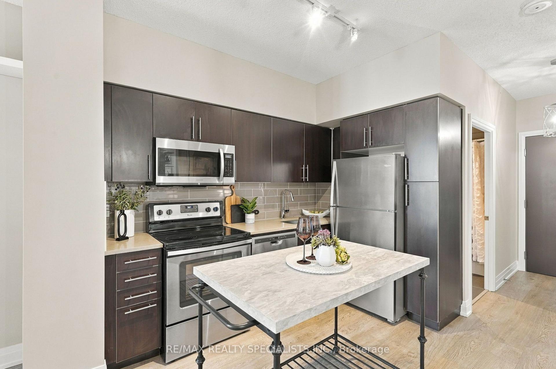 Photo 5 of Unit 313, 65 Speers Road, Oakville, Central — HOMEH