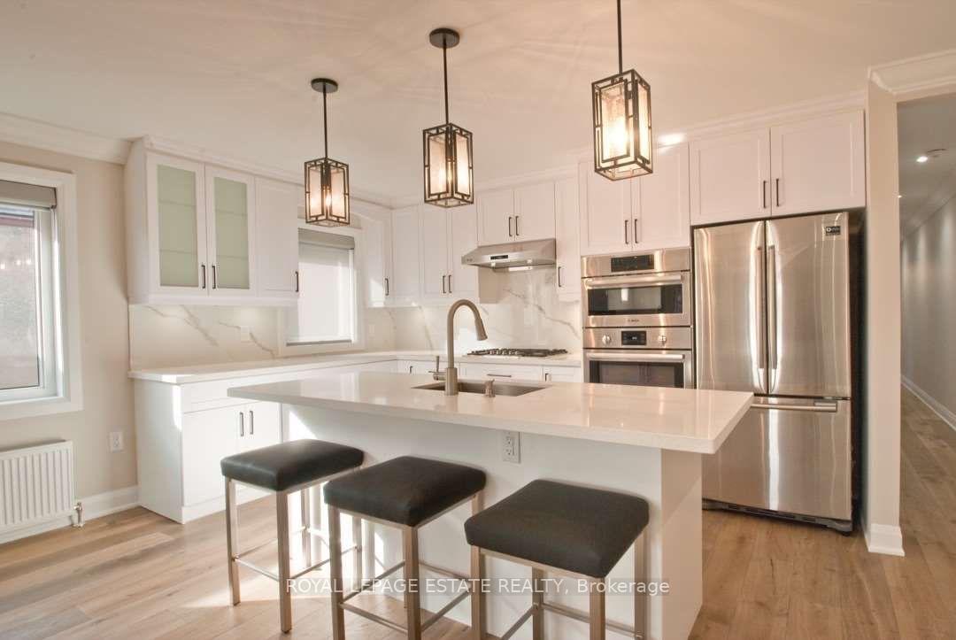 Photo 5 of Unit Upper, 22 Wineva Avenue, Toronto, The Beaches — HOMEH