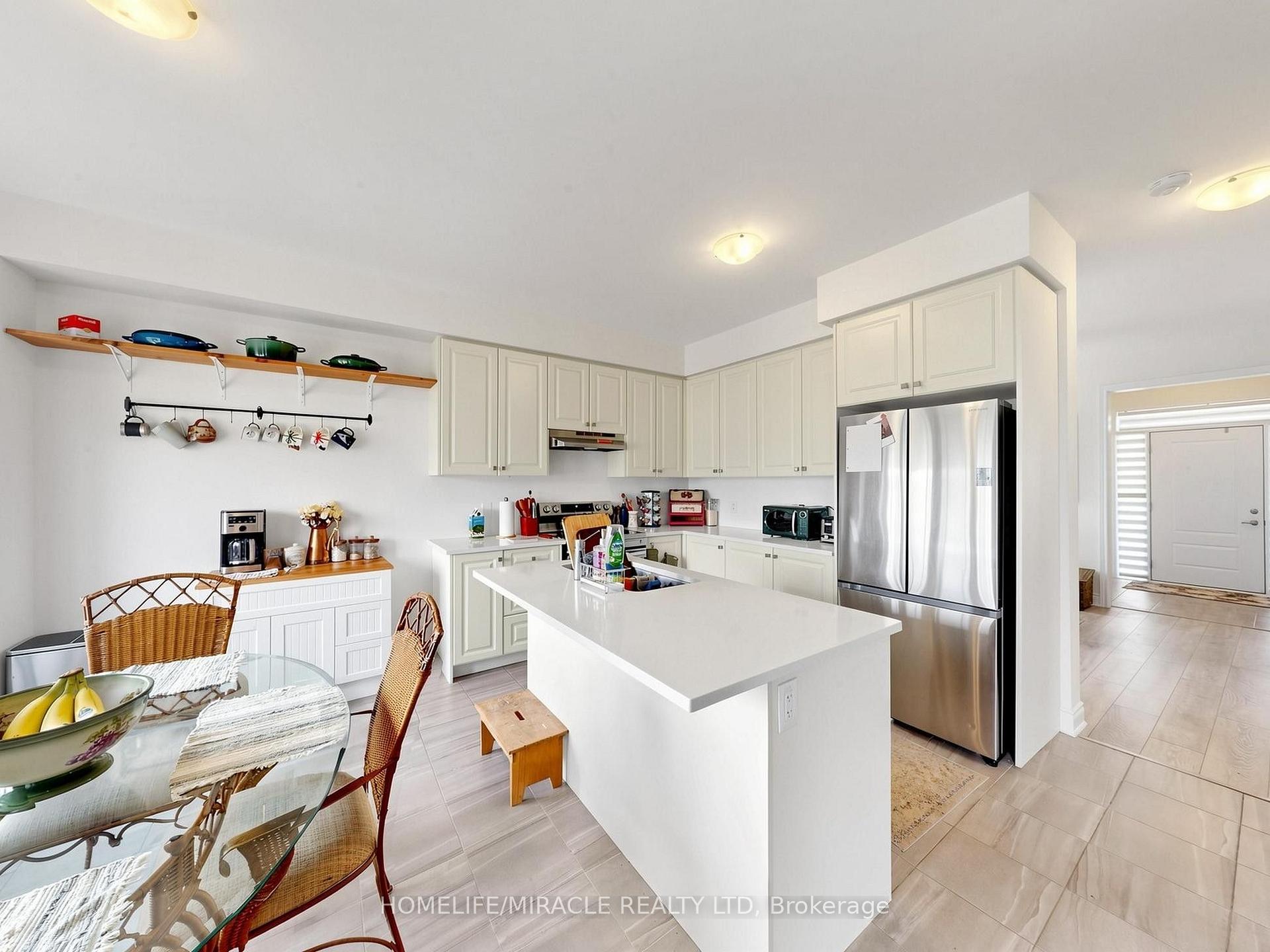Photo 10 of 60 Season Crescent, Wasaga Beach — HOMEH