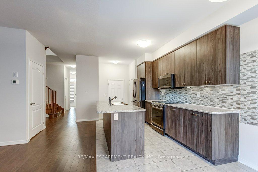 Photo 11 of 80 Oaktree Drive, Haldimand — HOMEH