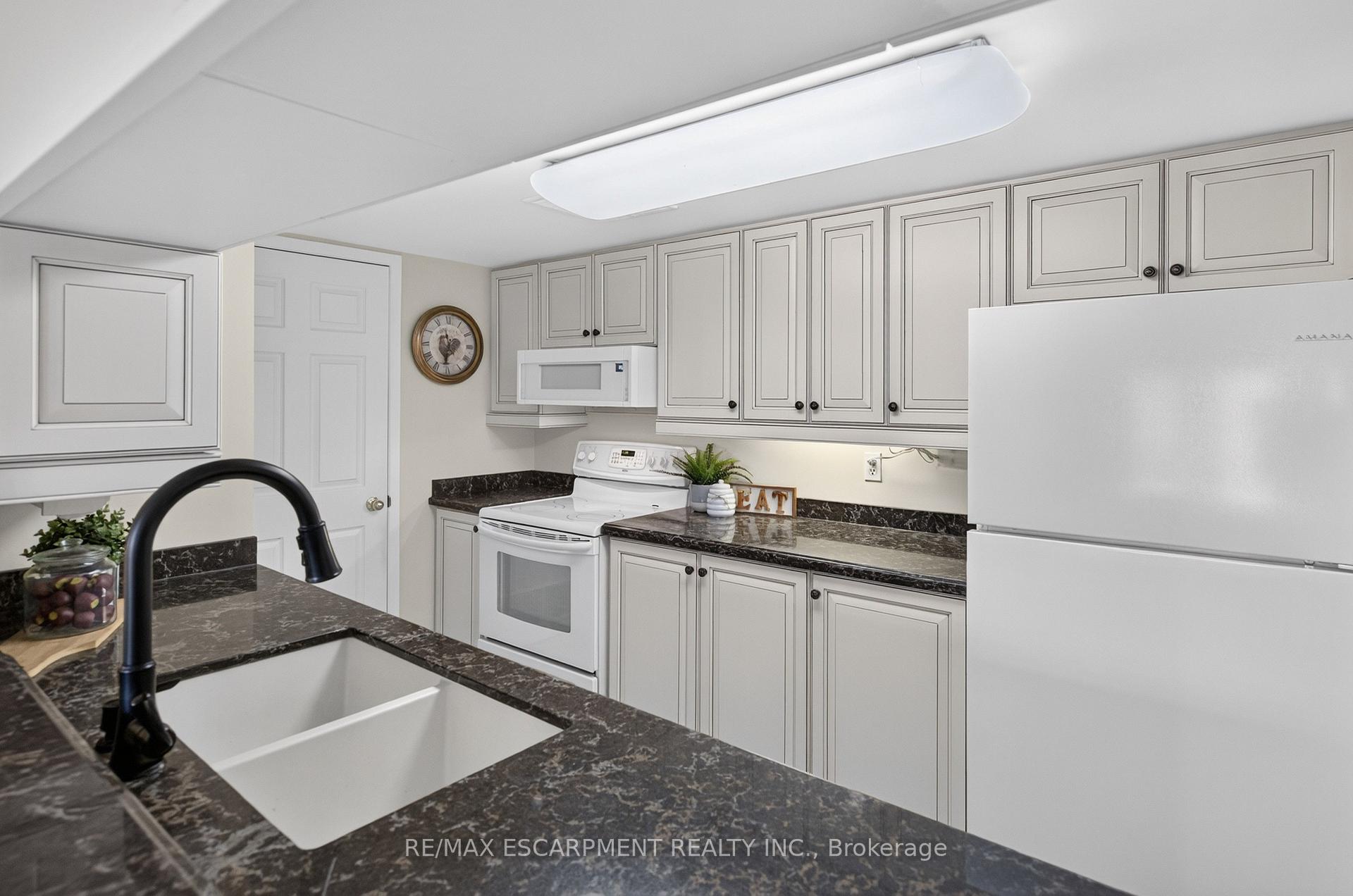 Photo 9 of Unit B404, 216 Plains Road W, Burlington, Bayview — HOMEH