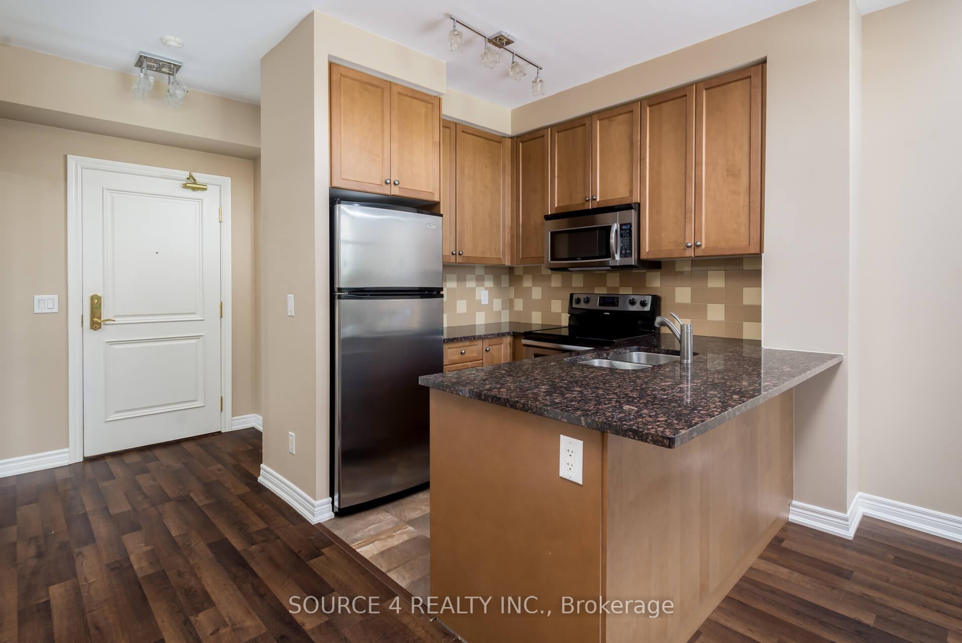 Photo 7 of Unit 201, 9245 Jane Street, Vaughan, Maple — HOMEH