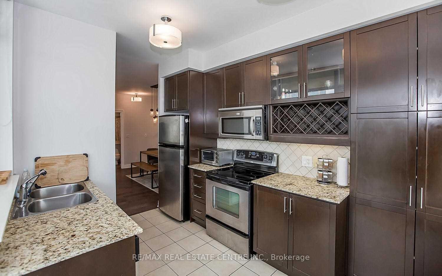 Photo 5 of Unit 1209, 80 Absolute Avenue, Mississauga, City Centre — HOMEH
