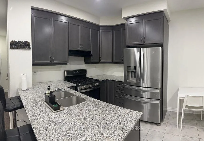Photo 5 of 411 Edenbrook Hill Drive, Brampton, Brampton West — HOMEH