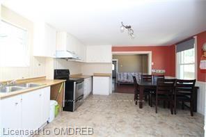 Photo 10 of 501 Queensdale Avenue E, Hamilton, Eastmount — HOMEH