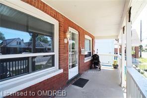 Photo 11 of 501 Queensdale Avenue E, Hamilton, Eastmount — HOMEH