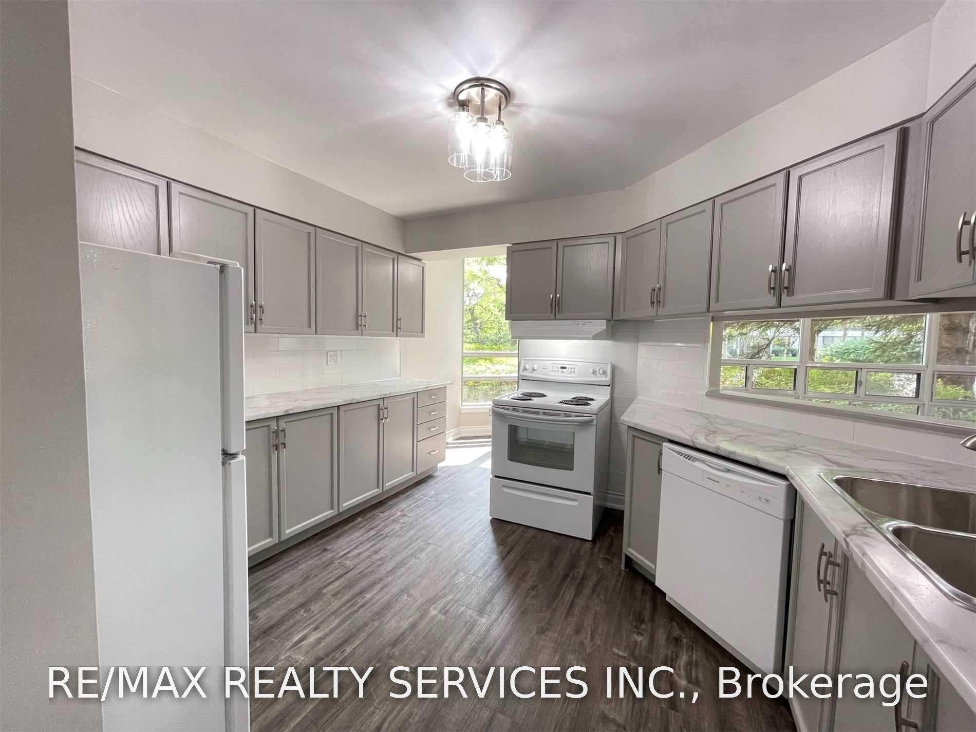 Photo 11 of Unit 104, 320 Mill Street S, Brampton, Brampton South — HOMEH