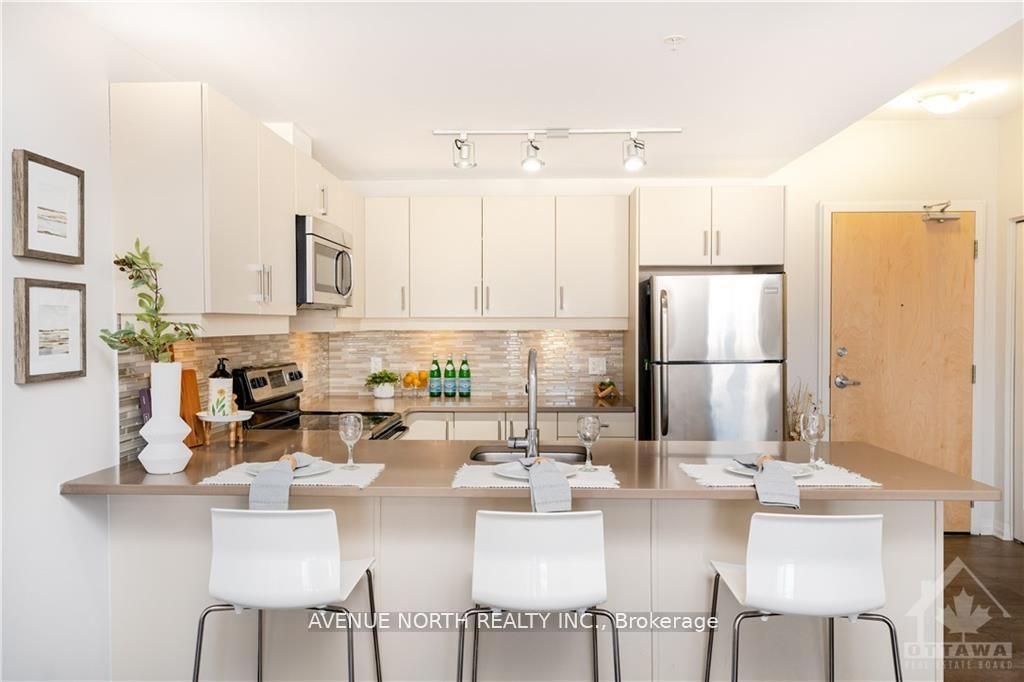 Photo 7 of Unit 401, 250 Winterfell Private, Ottawa, Hunt Club Park — HOMEH