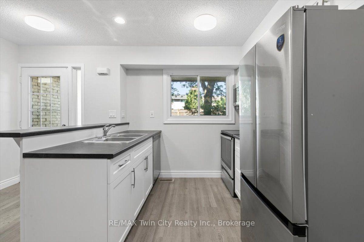 Photo 8 of Unit 8, 211 Veronica Drive, Kitchener, Centreville Chicopee — HOMEH