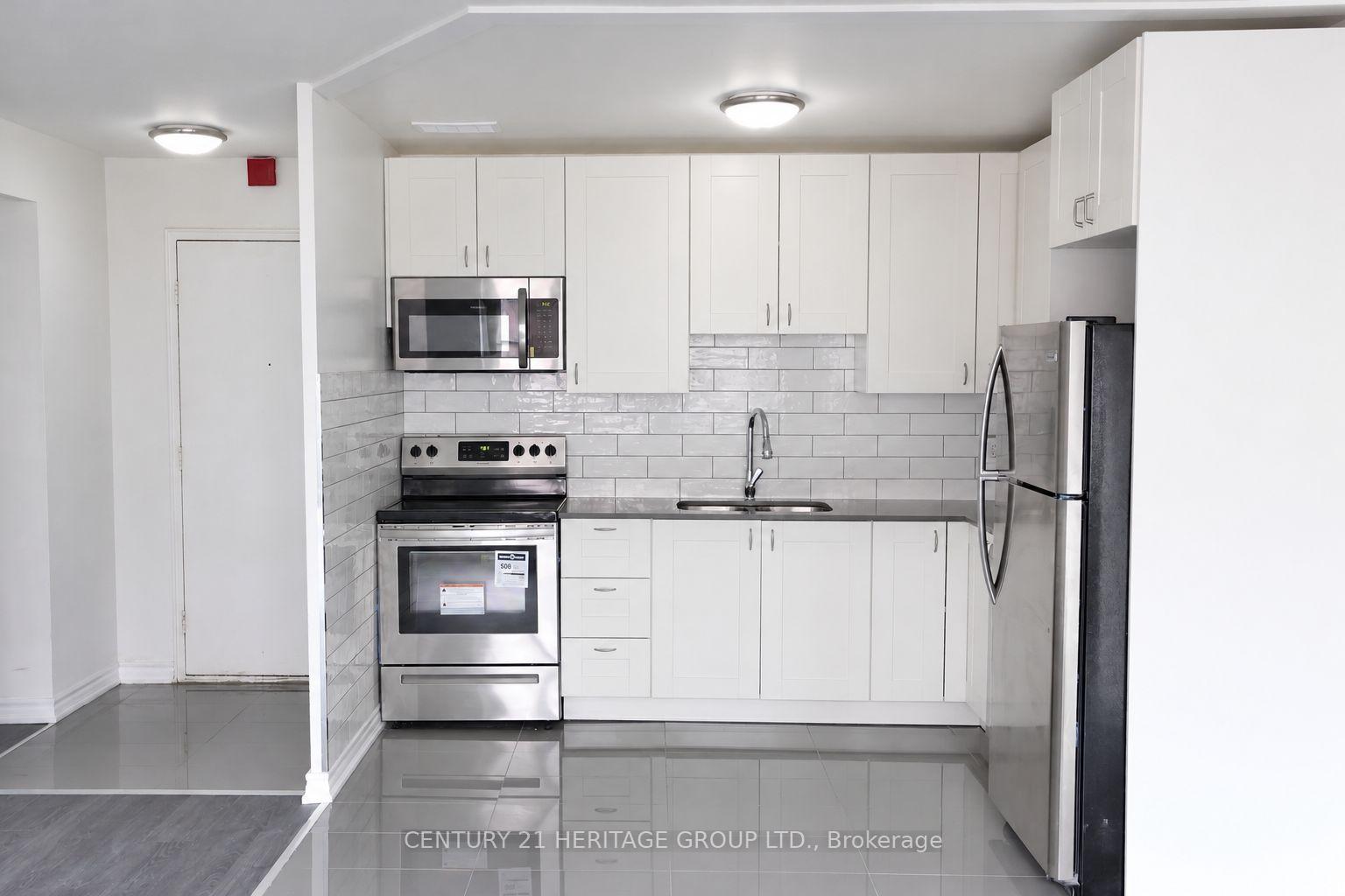 Photo 4 of Unit 211, 3101 Eglinton Avenue E, Scarborough, Scarborough Village — HOMEH