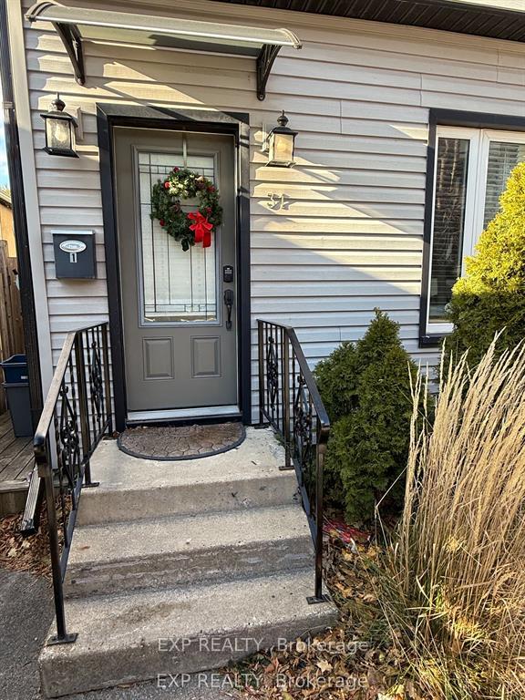 Photo 2 of Unit 1, 31 Raymond Street, St. Catharines, Downtown — HOMEH