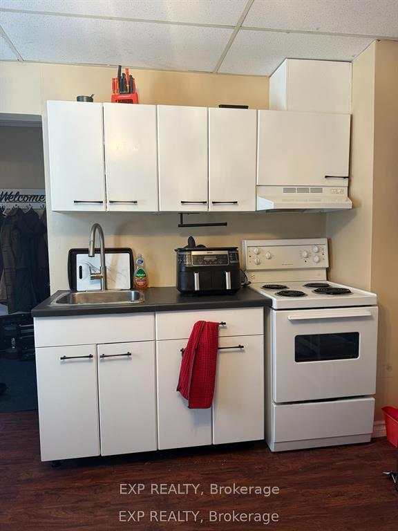 Photo 3 of Unit 1, 31 Raymond Street, St. Catharines, Downtown — HOMEH