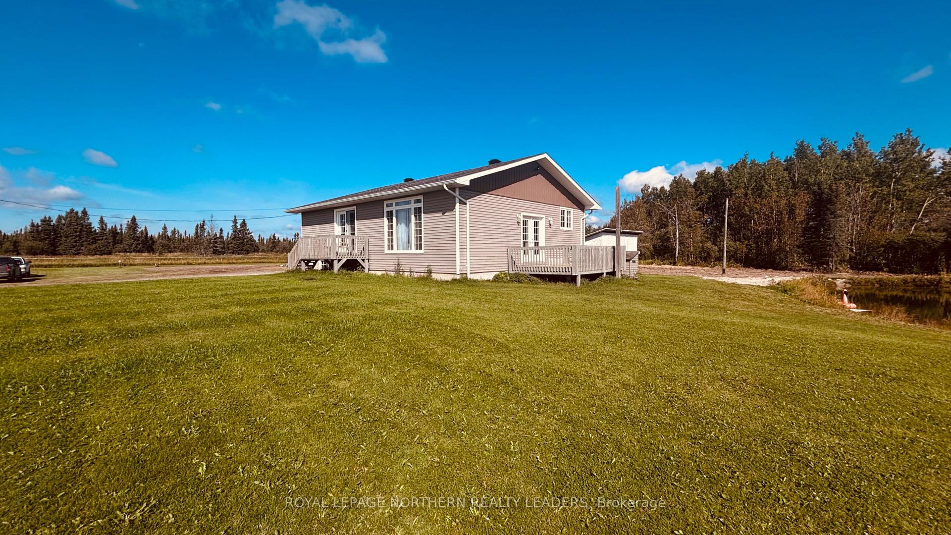 Photo 5 of 19 Nahma Road, Cochrane — HOMEH