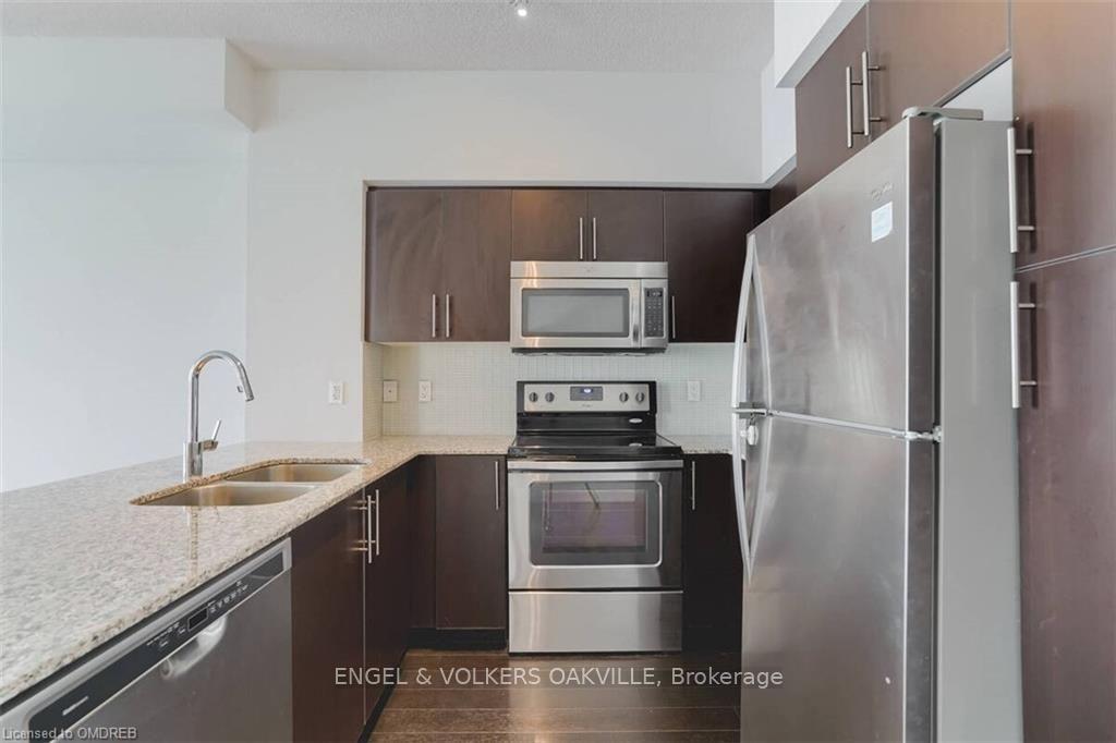 Photo 2 of Unit 710, 65 Speers Road, Oakville, Central — HOMEH