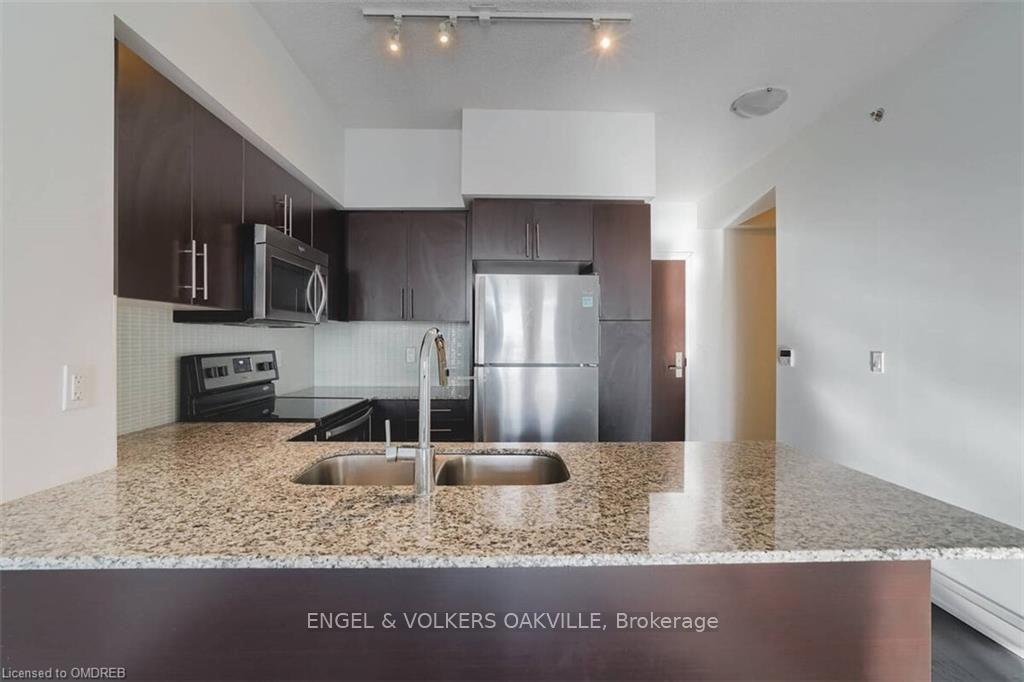 Photo 3 of Unit 710, 65 Speers Road, Oakville, Central — HOMEH