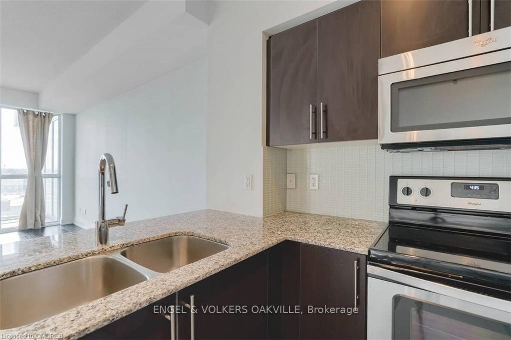 Photo 4 of Unit 710, 65 Speers Road, Oakville, Central — HOMEH