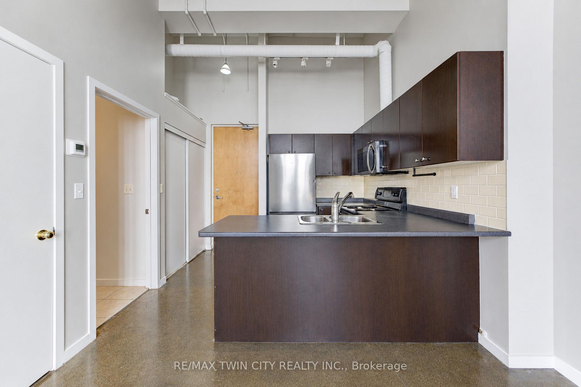 Photo 2 of Unit 405, 404 King Street W, Kitchener, City Commercial Core — HOMEH