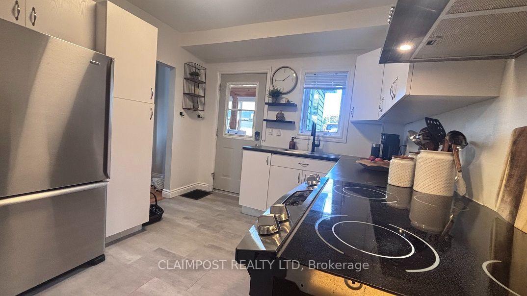 Photo 17 of 236 Hemlock Street N, Timmins, TNE - Hill District — HOMEH