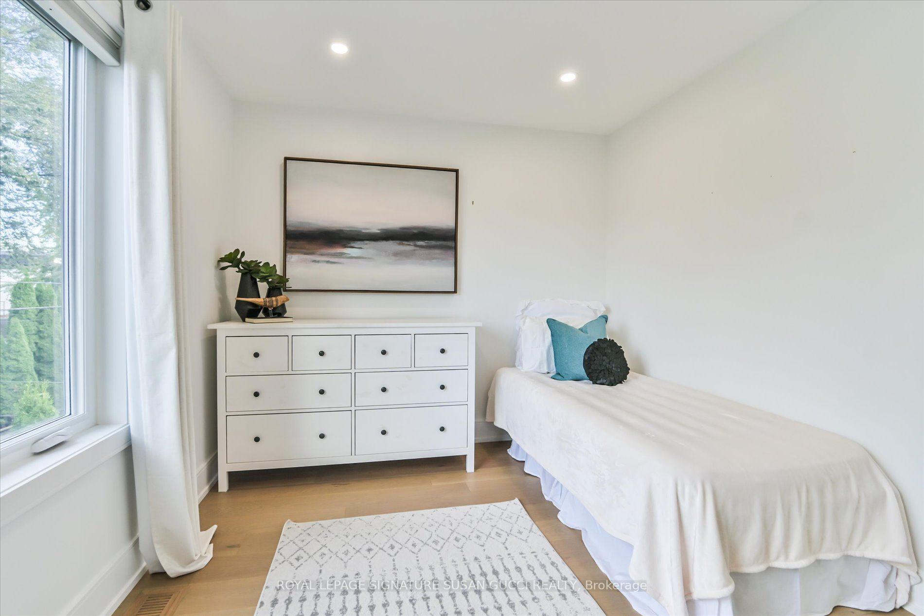 Photo 24 of 7A Everett Crescent, Toronto, Woodbine-Lumsden — HOMEH