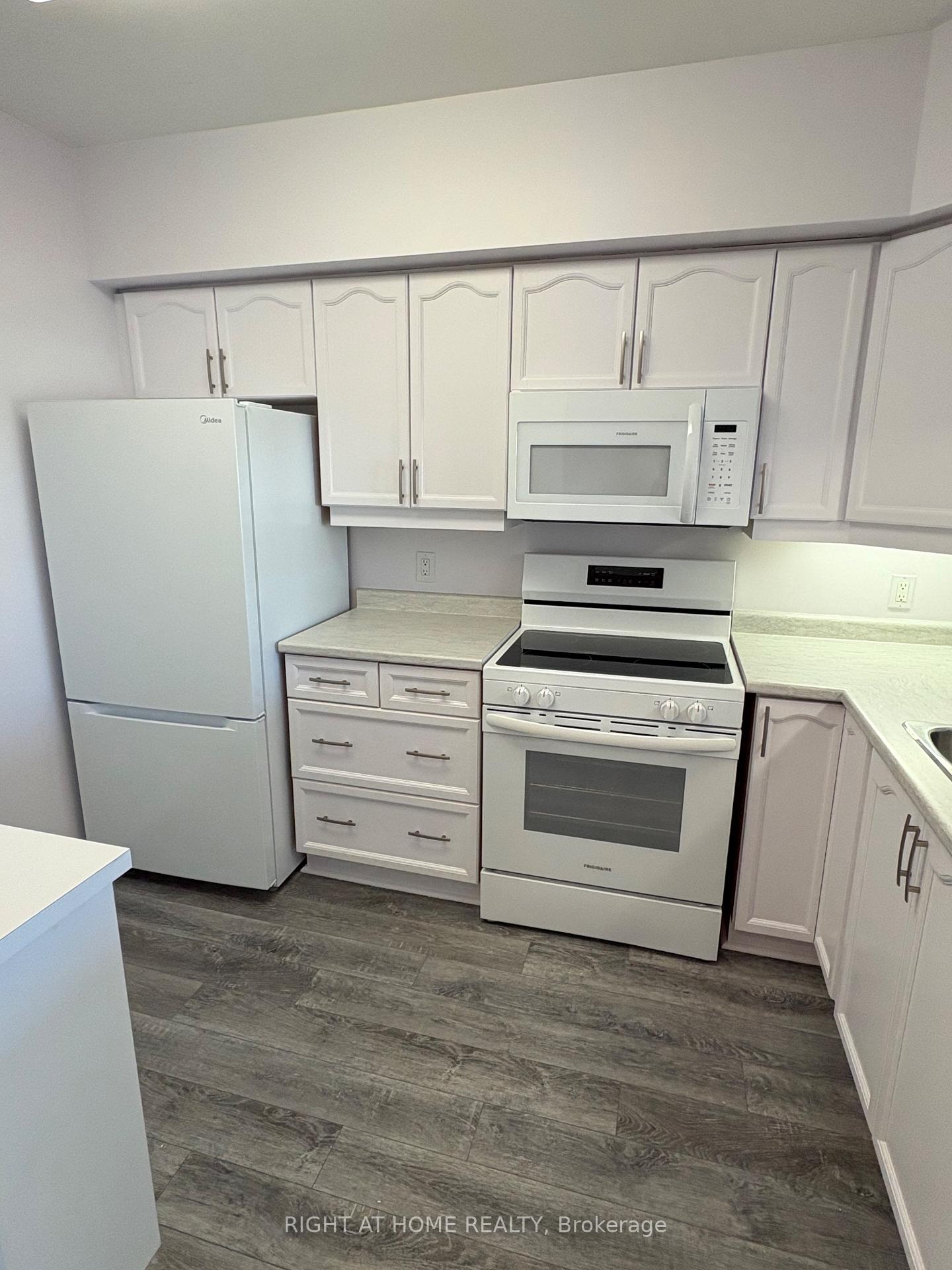 Photo 25 of Unit 203, 90 Dean Avenue, Barrie, Painswick South — HOMEH