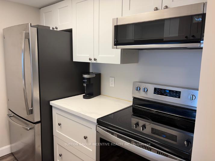Photo 10 of Unit 1105, 75 Ellen Street, Barrie, City Centre — HOMEH