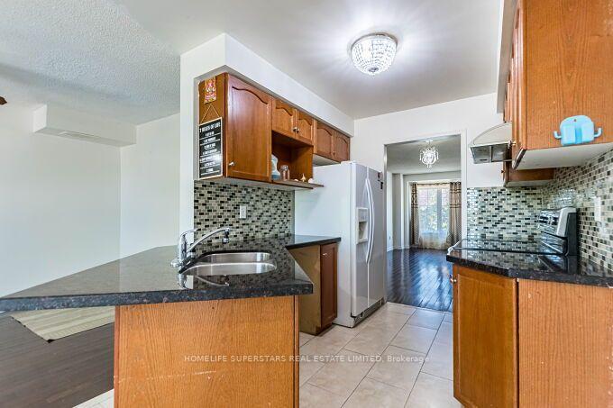 Photo 17 of Unit 06, 170 Havelock Drive, Brampton, Fletcher's Creek South — HOMEH