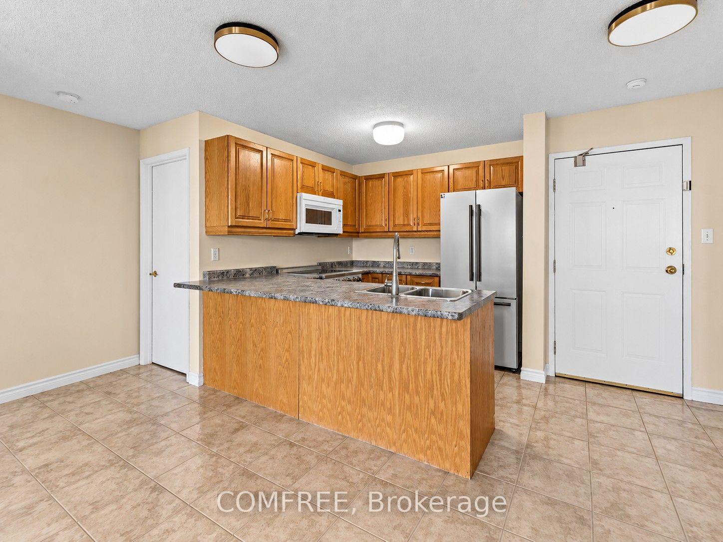 Photo 4 of Unit 409, 3000 Sandwich Street, Windsor — HOMEH