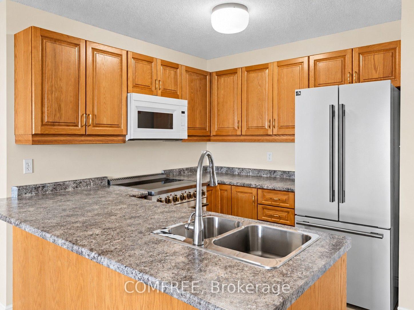 Photo 5 of Unit 409, 3000 Sandwich Street, Windsor — HOMEH