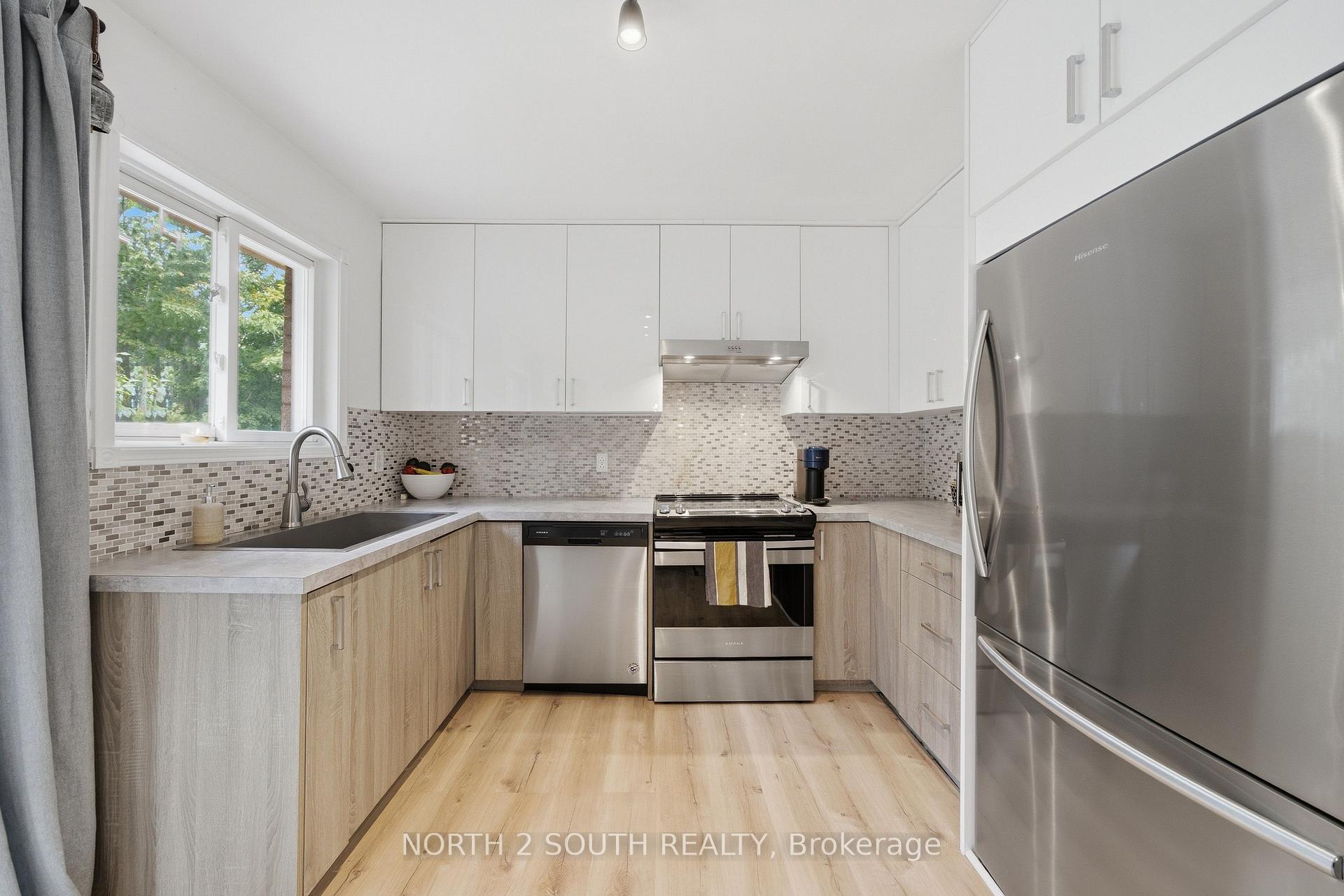Photo 15 of 74 Leo Boulevard, Wasaga Beach — HOMEH
