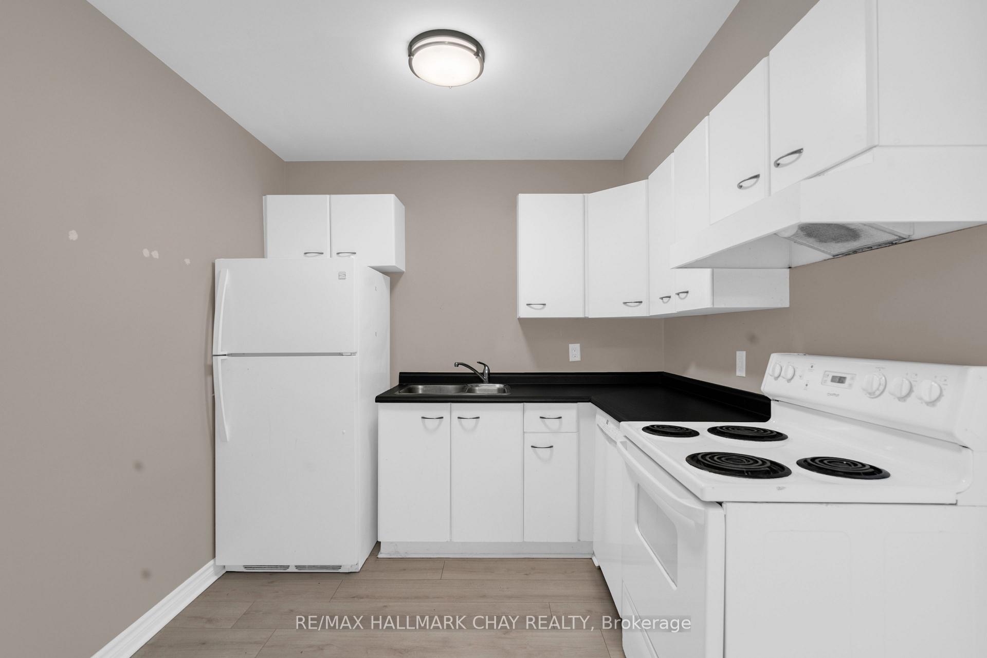 Photo 4 of Unit 414, 126 Bell Farm Road, Barrie, Alliance — HOMEH